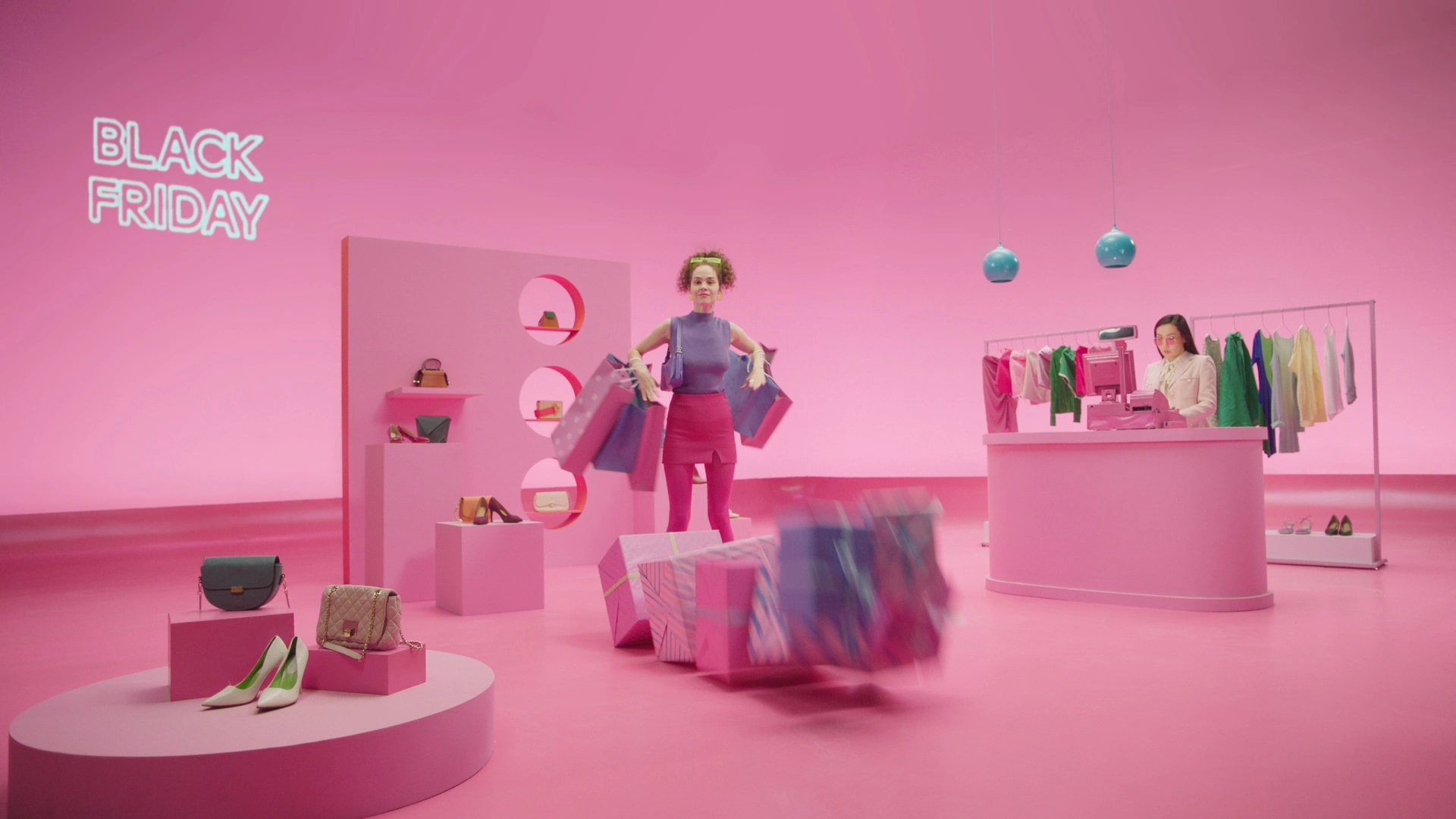 A shopper stands among colorful gifts in a Wish.com Black Friday campaign